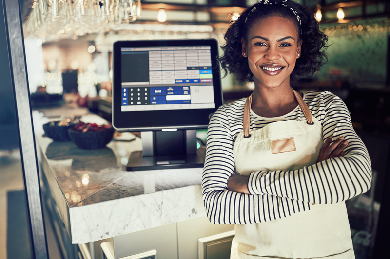 woman using epos machine